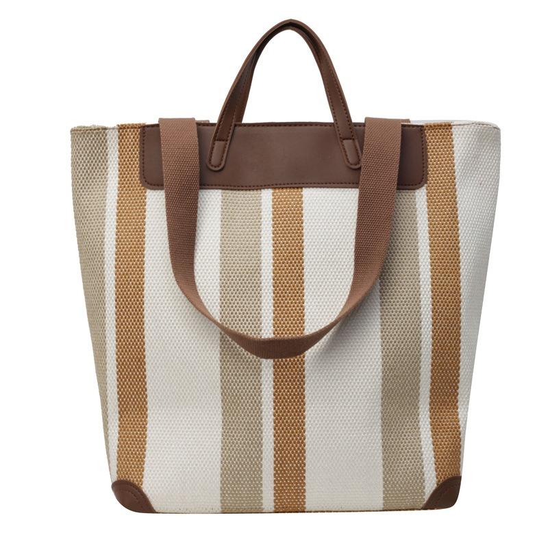 Niche retro canvas bag women's new fashionable large-capacity tote bag class commuter shoulder tote bag