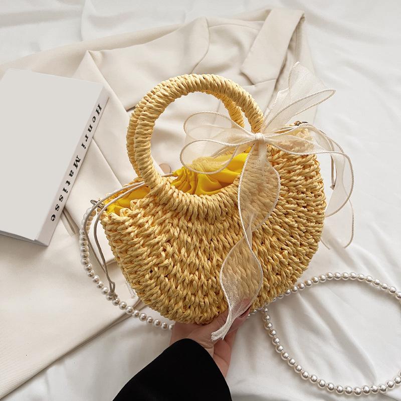 

Соломенная сумка Yogodlns с бантом для женщин, женская пляжная сумка с жемчужным ремешком, тканая сумка на плечо ручной работы, богемная сумка с верхней ручкой 23x8x20cm жёлтый