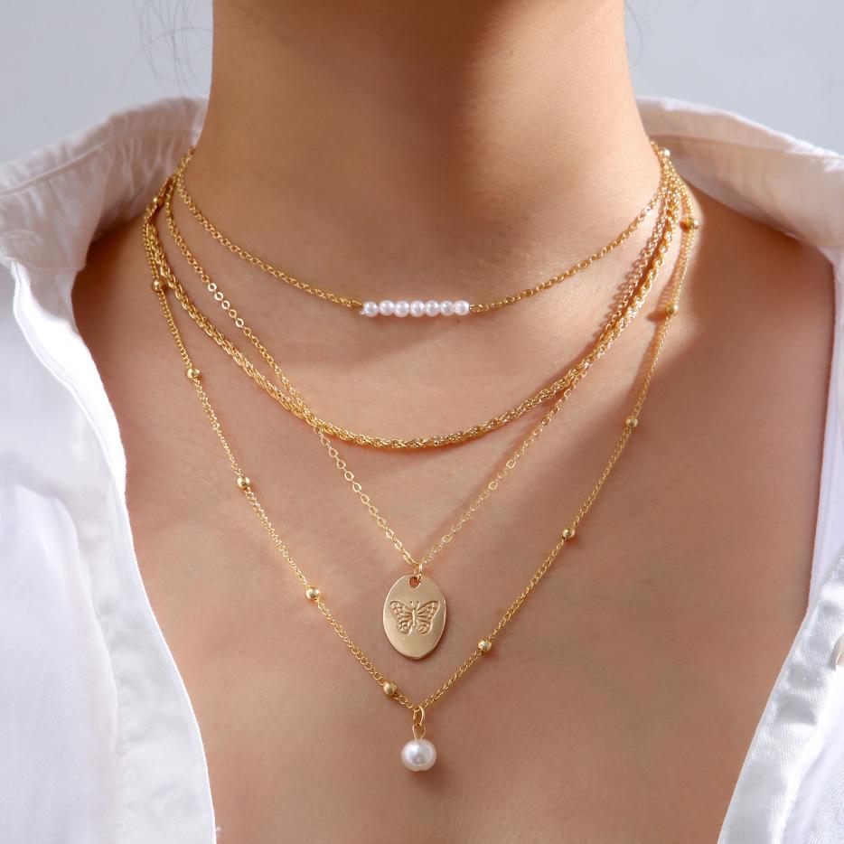 

Trendy Butterfly Pearl Necklace Set: Creative Design, 4-Piece Women s Fashion Accessory