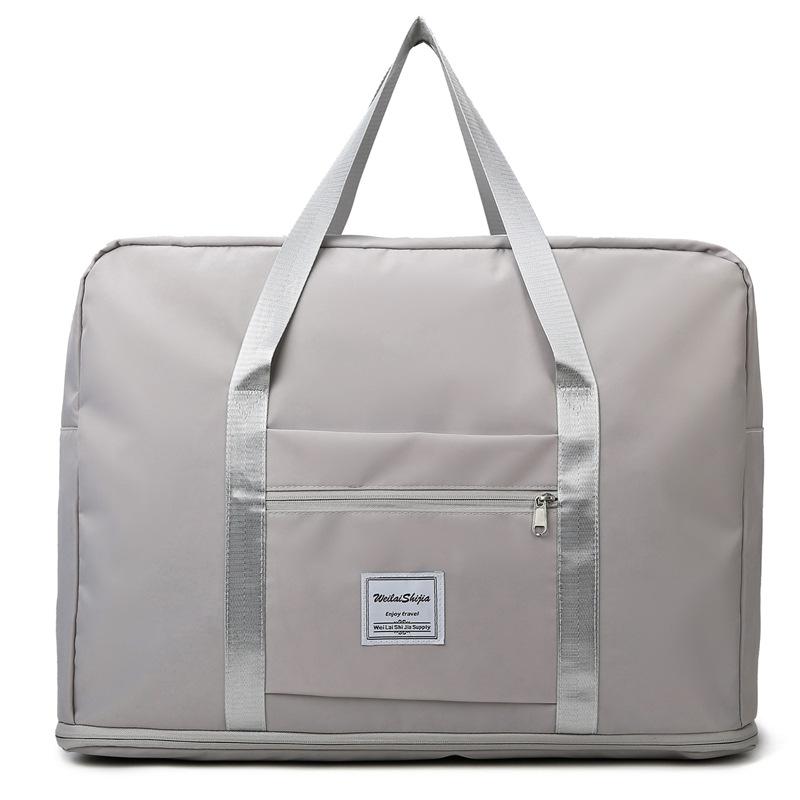 Luggage bags, new large-capacity expansion short-distance travel bags, portable maternity and maternity storage bags.