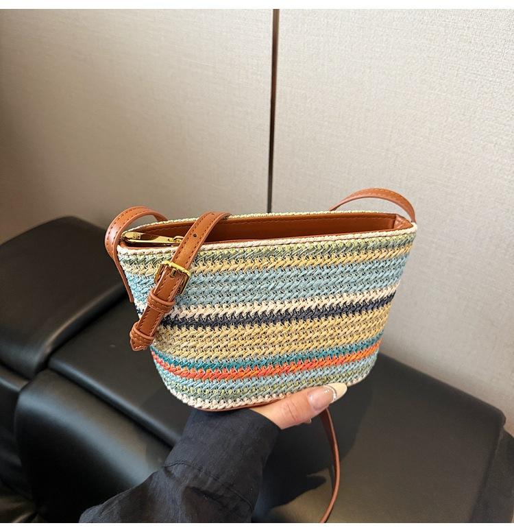 

Seaside beach straw bag women s 2025 new summer versatile messenger bag niche woven bucket bag