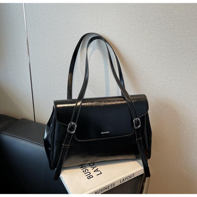 

Single shoulder commuter underarm bag women s new high-end light luxury niche retro large-capacity bag чёрный