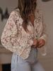Ivory Ruffle Hem Lace Blouse with Tie Cuff Detail