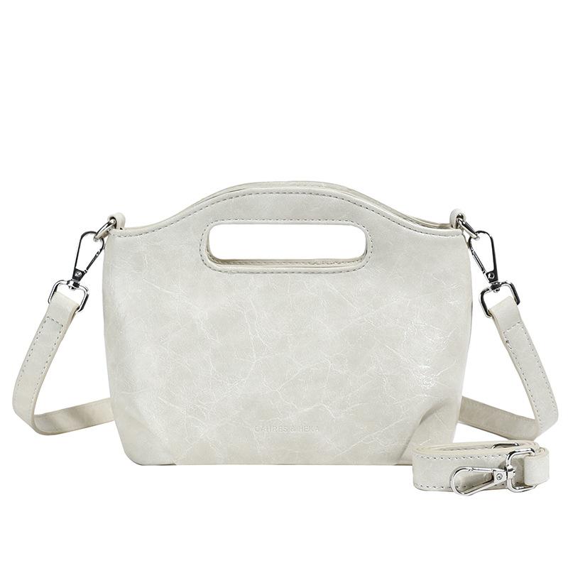 Wholesale simple style texture portable bucket bag fashion casual women commuting niche design messenger bag