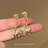 Mosquito coil disc, ear clips, high-end ethnic style, zircon safety lock, ear buckle, popular fashion, versatile lucky lock earrings.