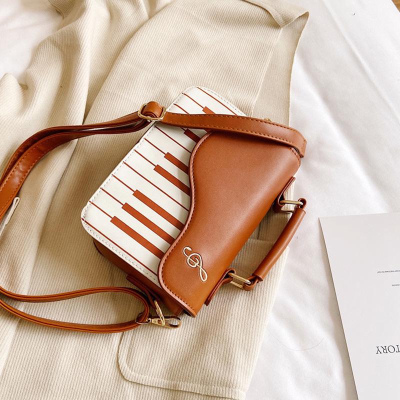 Søt pianomønster Pu-skinn Uformelt dameskulderveske Kvinners Flap Crossbody-veske