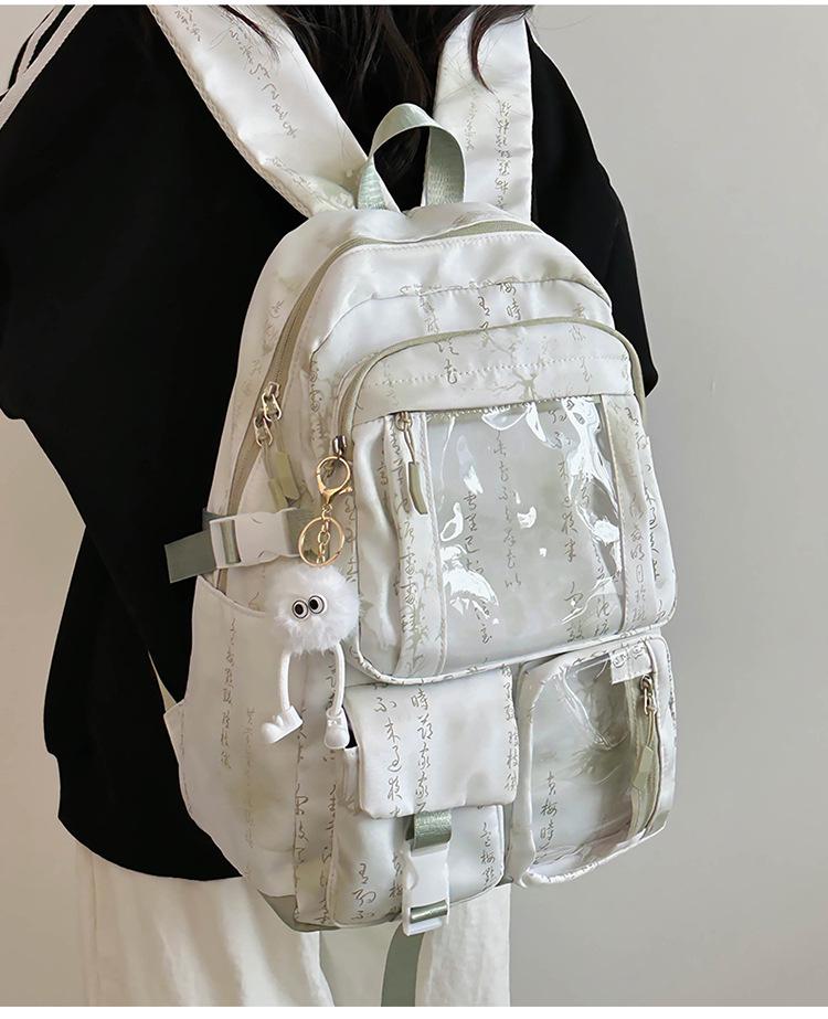 Middle School Chinese-Style Transparent Backpack with Multiple Pockets - Large Capacity, Waterproof, Wear-Resistant, Unisex, Light Luxury Design.