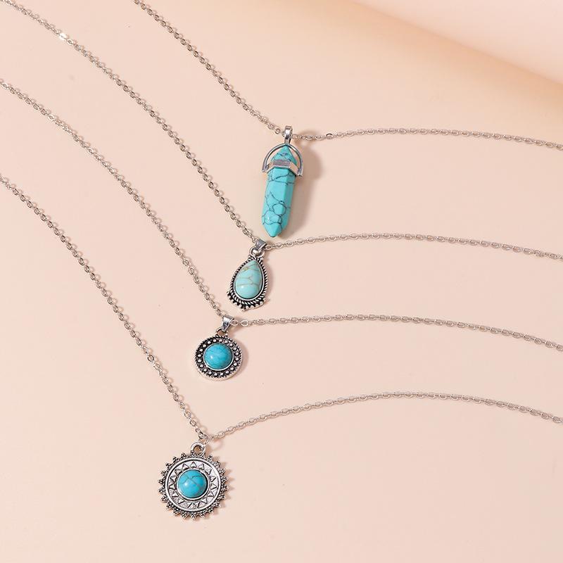 Collana in stile etnico vintage con goccia d'acqua, collana turchese, pilastro esagonale con sole