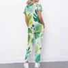 Women Plus Size Tropical Leaf Print Scrub Set Cutout Neck Short Sleeve Top With Pockets Long Pants