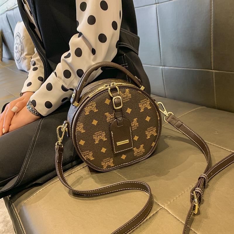 Bag women's new versatile messenger bag fashionable texture shoulder bag portable small round bag