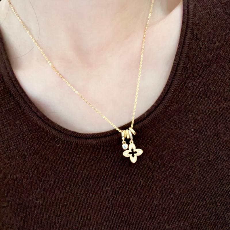 Exquisite Zirconia Flower Pendant Necklace with Round Ring and Sweater Chain - Light Luxury Petal Collarbone Accessory.