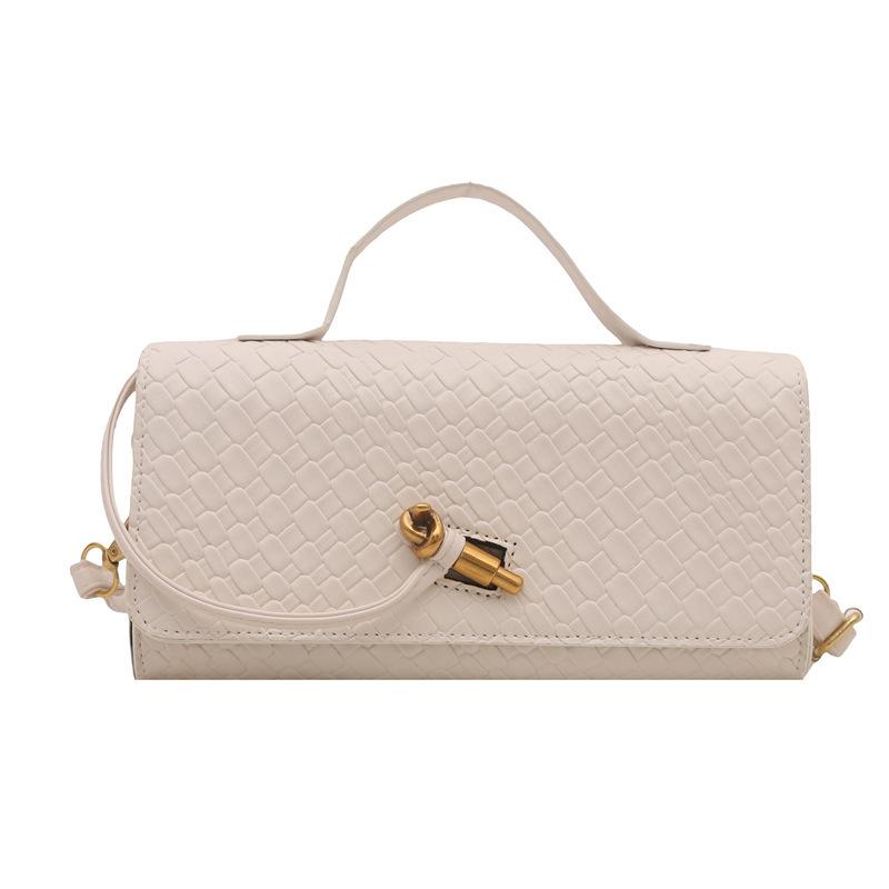 Mode exquisite Weberei 2025 einfarbig lässig Schloss große Kapazität ausländischer Stil horizontal Umhängetasche Baguette Damen Tasche