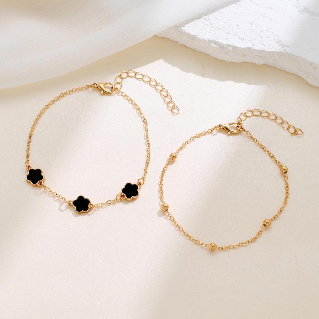 Koreaanse Stijl 4-delige Sieradenset: Bloemenarmband, Ring, Oorbellen met Stud & Klavertje Vier Ketting
