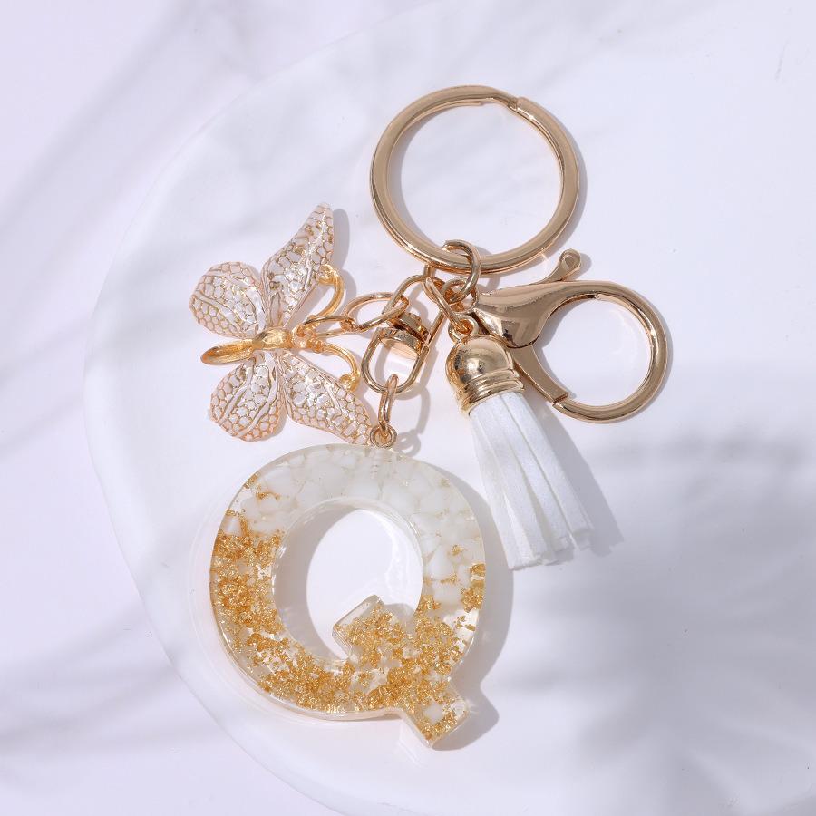 Chic White Tassel Letter Keychain with Resin Epoxy Pendant - Stylish Ornament for Bags