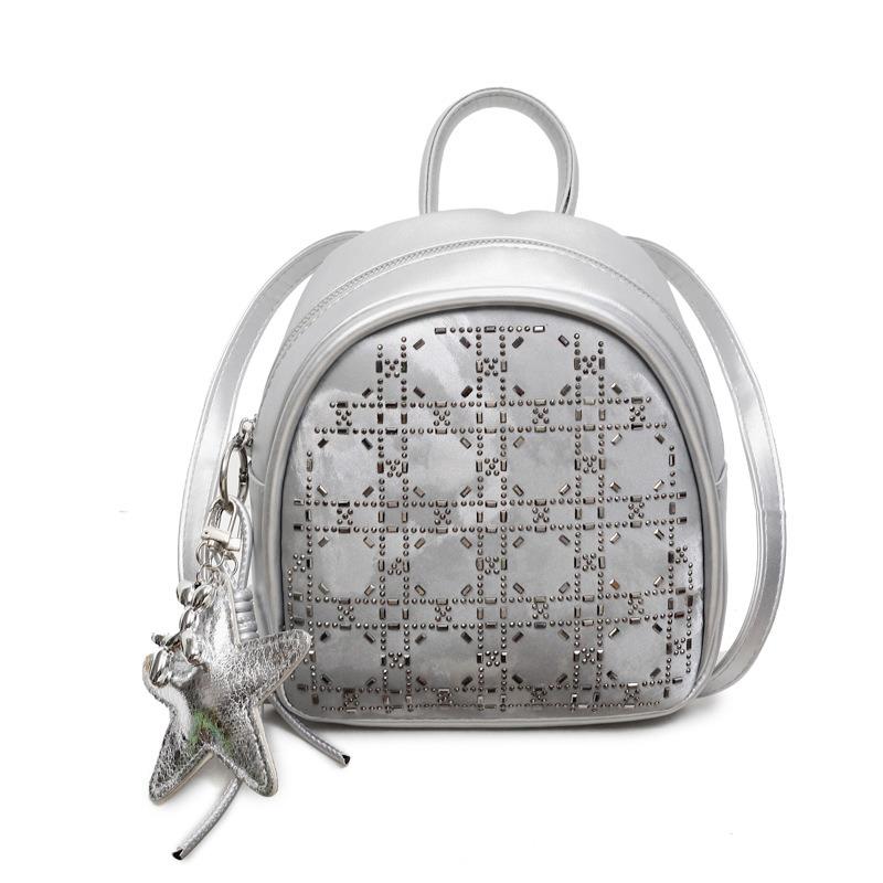

Summer new high-end dual-purpose backpack niche design rivet exquisite oblique span mini bag срібний