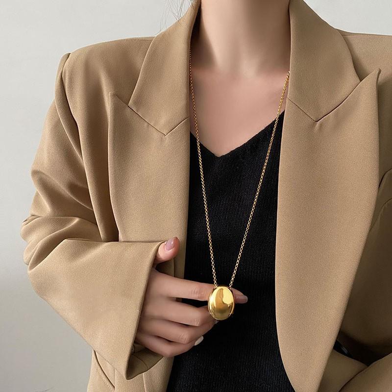 New Chinese leather pendant, fringed necklace, female ethnic style, niche retro sweater chain, fashion and high-end item jewelry.