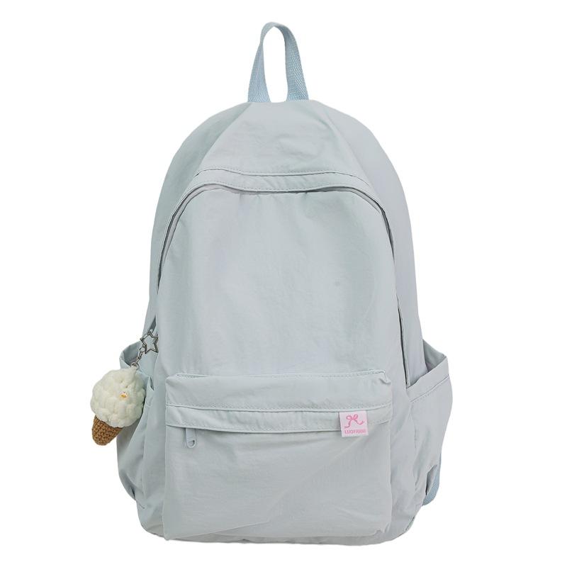 Japanese simple solid color schoolbag female college student casual versatile backpack large capacity junior high school student travel backpack