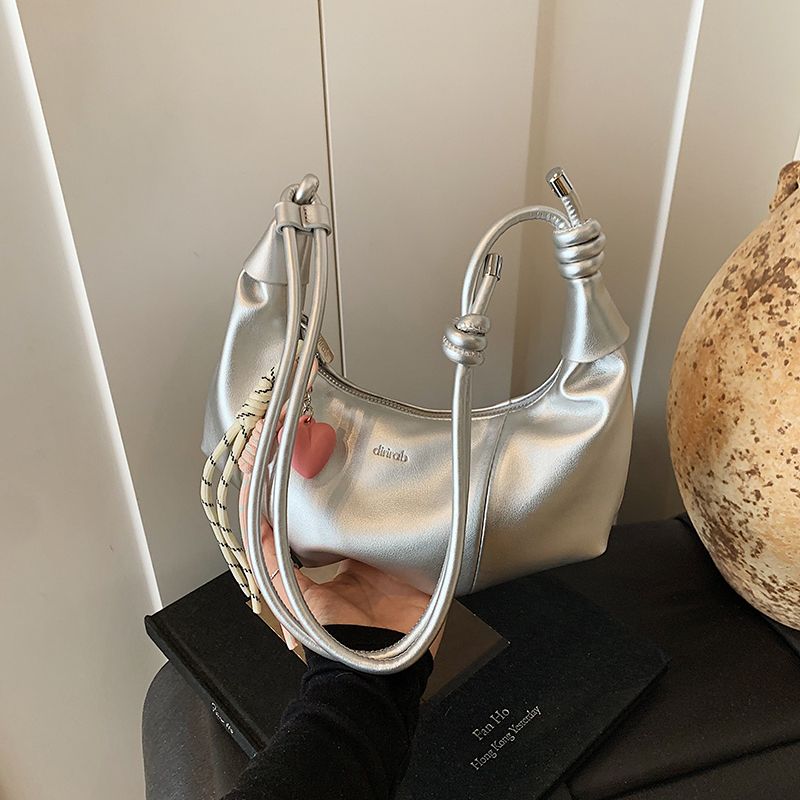 

Summer Silver Super Popular Horn Bag Women s 2025 New Arrival Fancy Niche Style Casual Crossbody Dumpling Bag Silver + pendant