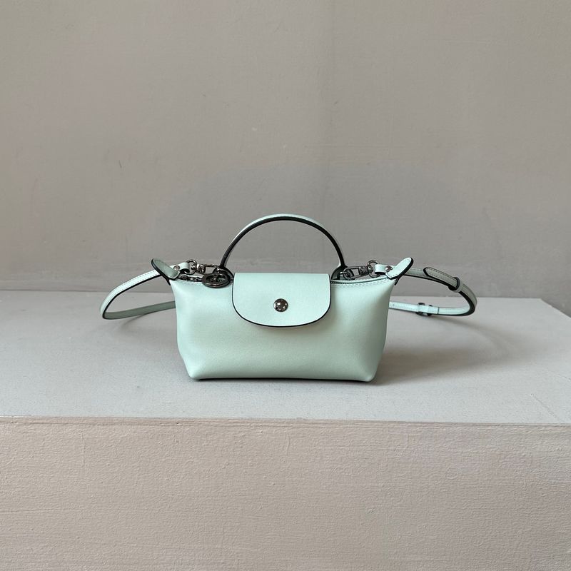 

Full-grain Leather Mini Dumpling Bag Ingot Portable Small Bag Women Single Handle Cosmetic Bag Shoulder Messenger Bag Mobile Phone Bag