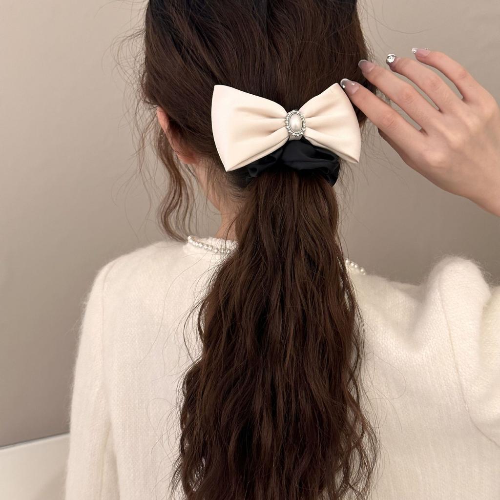 A Tall and Elegant Bow Tie, Hair Band, Headwear, High Elastic Hair Tie, and A Hair Tie At The Back of The Head