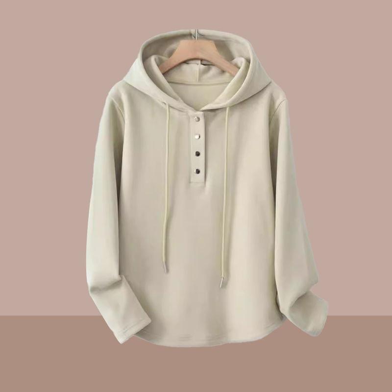 Suéter holgado y elegante con capucha para mujer para principios de primavera: estilo corto a la moda.