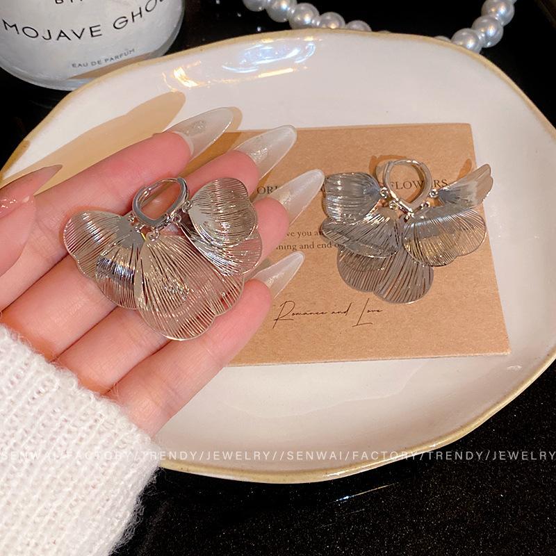 Hollow petals fringed silver ear buckles women's cold wind design light luxury unique earrings ear jewelry