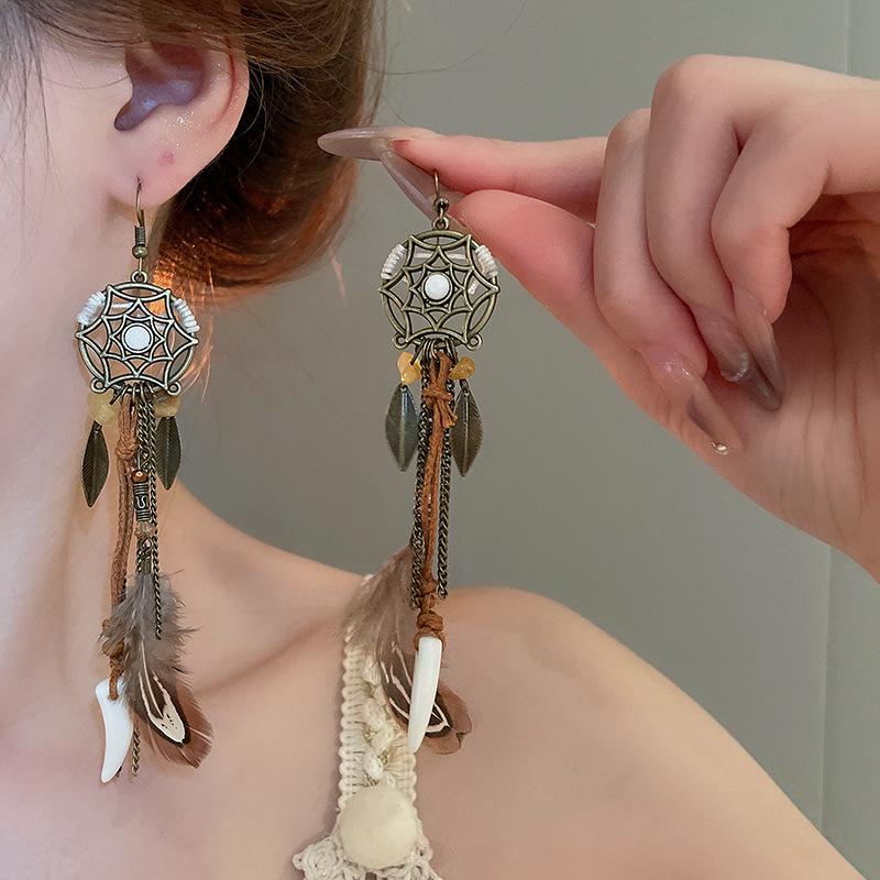 Retro Ethnic Bell Tassel Earrings: Exquisite, Fashionable Dangle Design with Light Luxury Appeal.