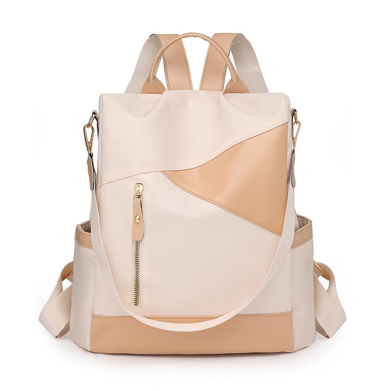 

Splicing backpack women s contrasting soft leather shoulder bag 2025 new student multi-purpose women s backpack