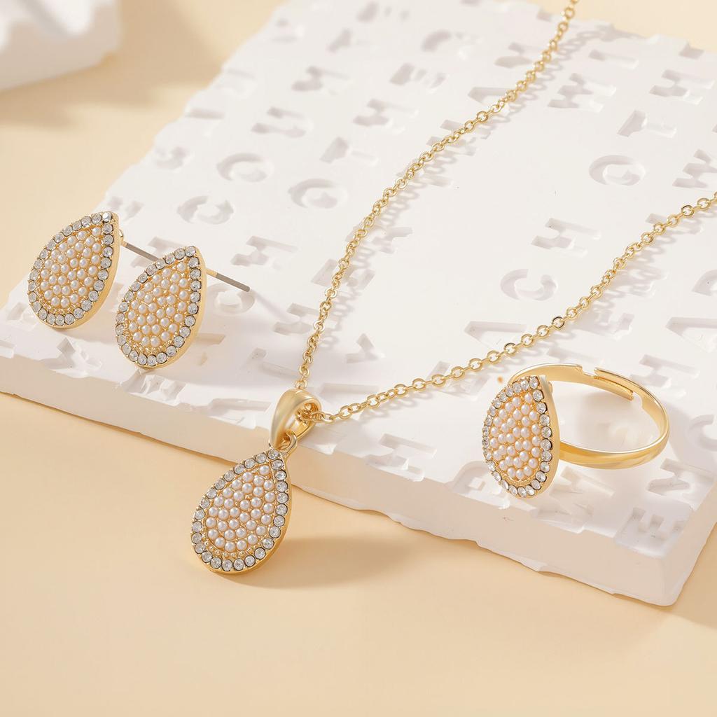 New Water Drop Pearl Inlaid with Diamonds Jewelry Set for Women, Gold Bracelet, Ring, Necklace, Earrings Four-Piece Set