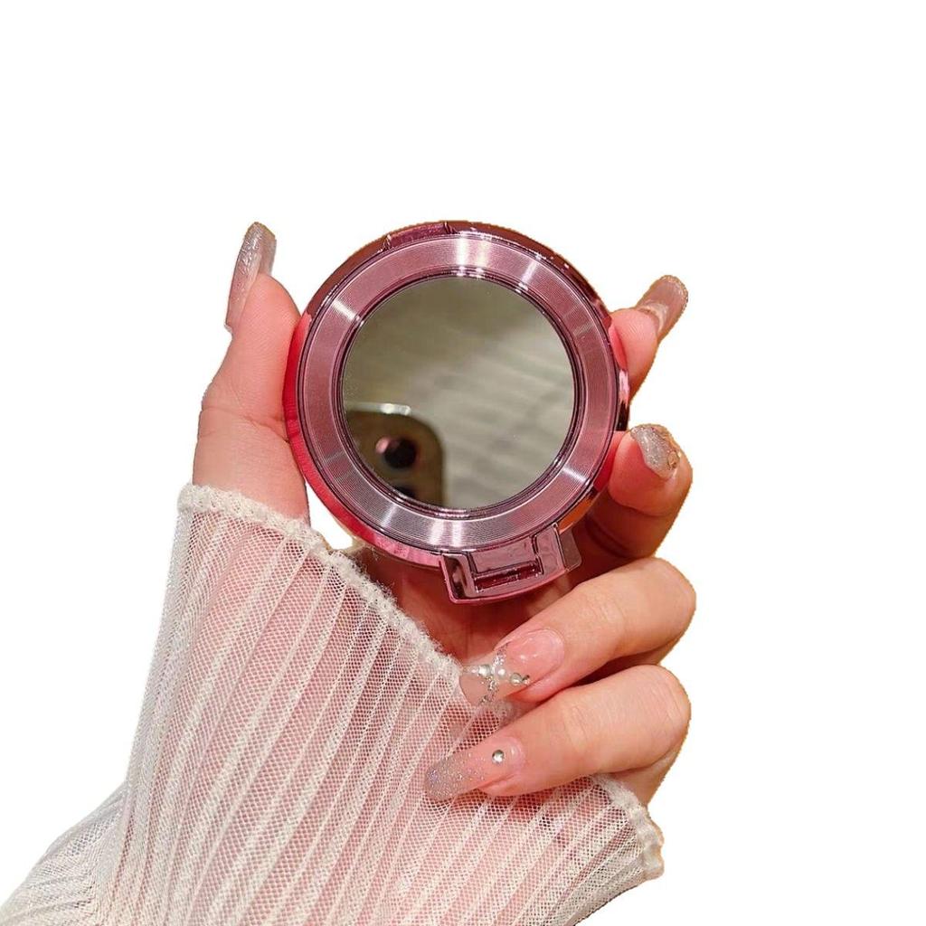 Ultra-thin Magnetic Ring Stand with CD Pattern for Mobile Phones - Foldable, Adhesive, and MagSafe Compatible.