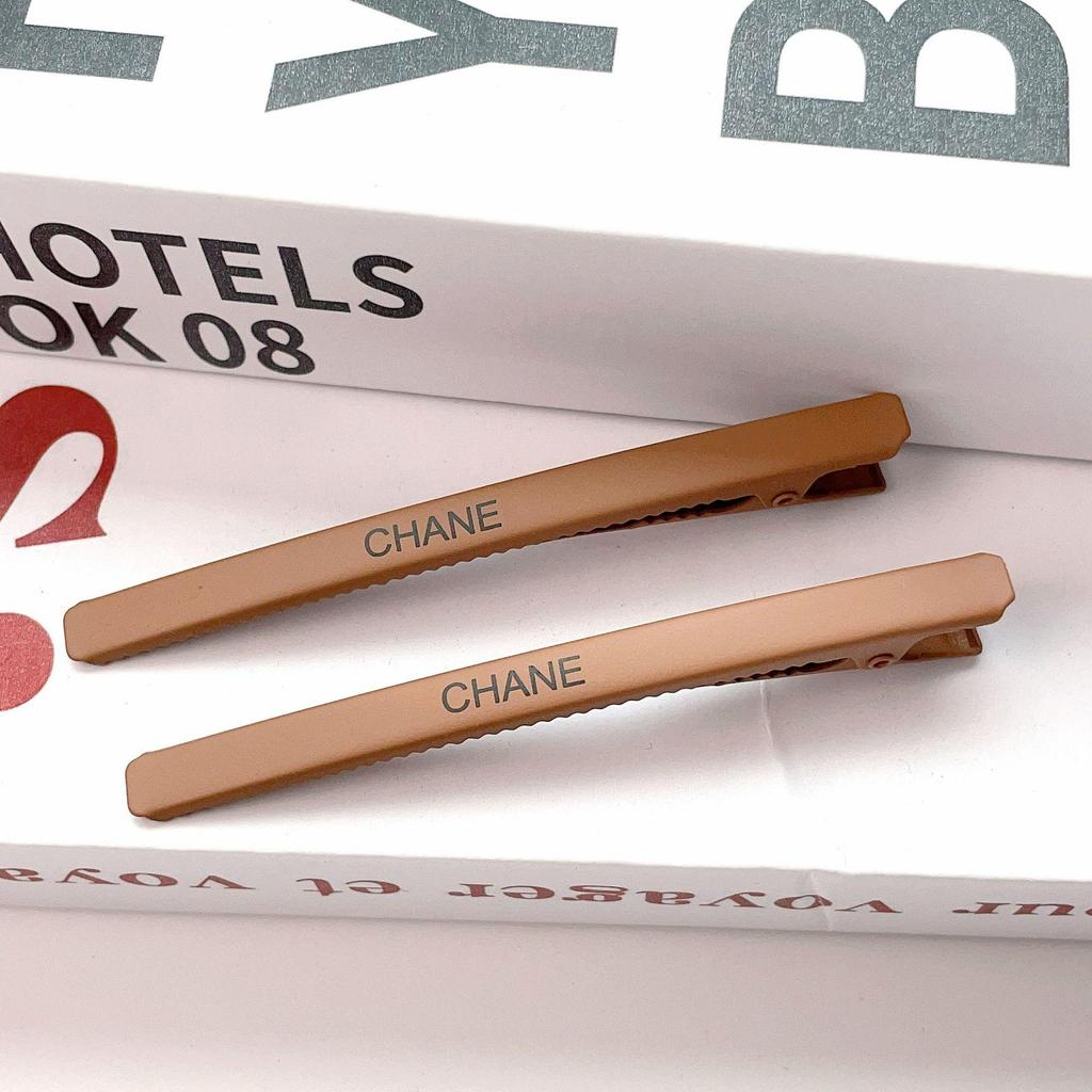 Xiaoxiang Brief Metall-Seitenclip: Hochwertiges Stirn- und Haaraccessoire