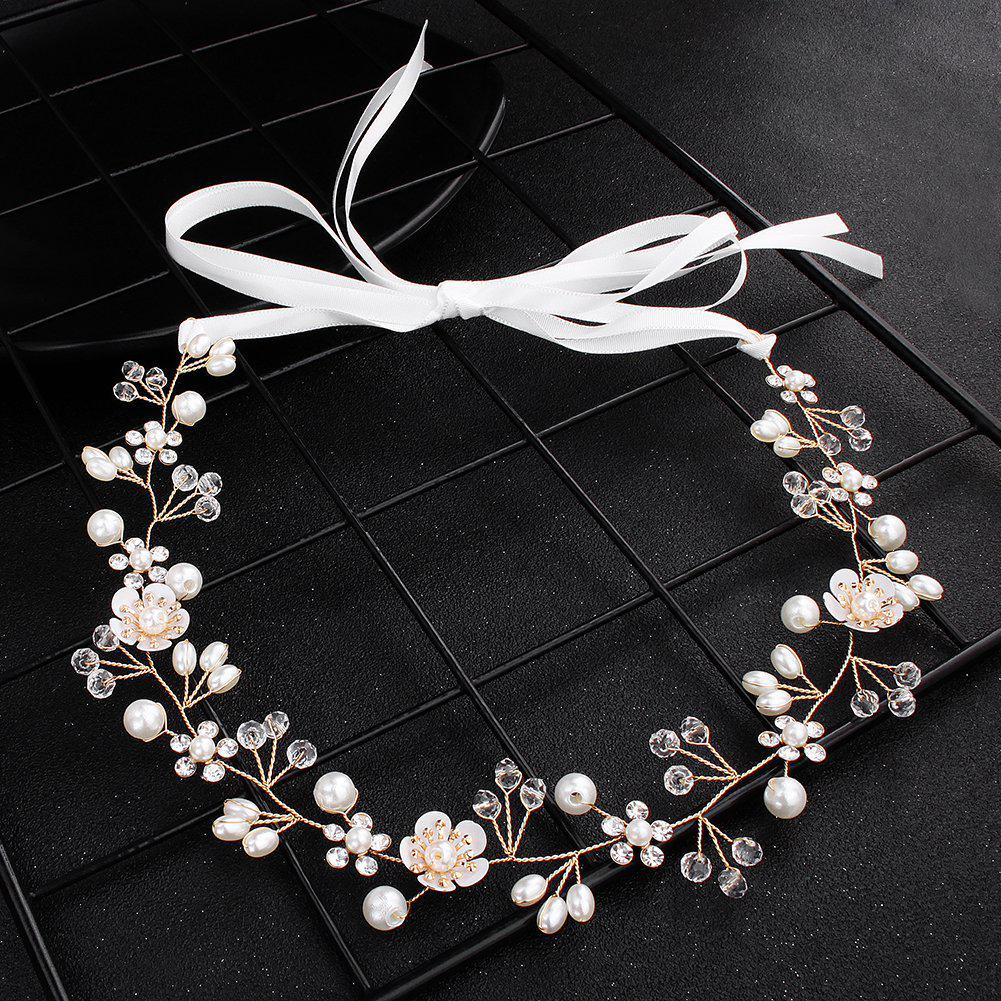 Handgefertigter Braut-Haarkamm mit Perlen, Strass und Blumen mit Blättern