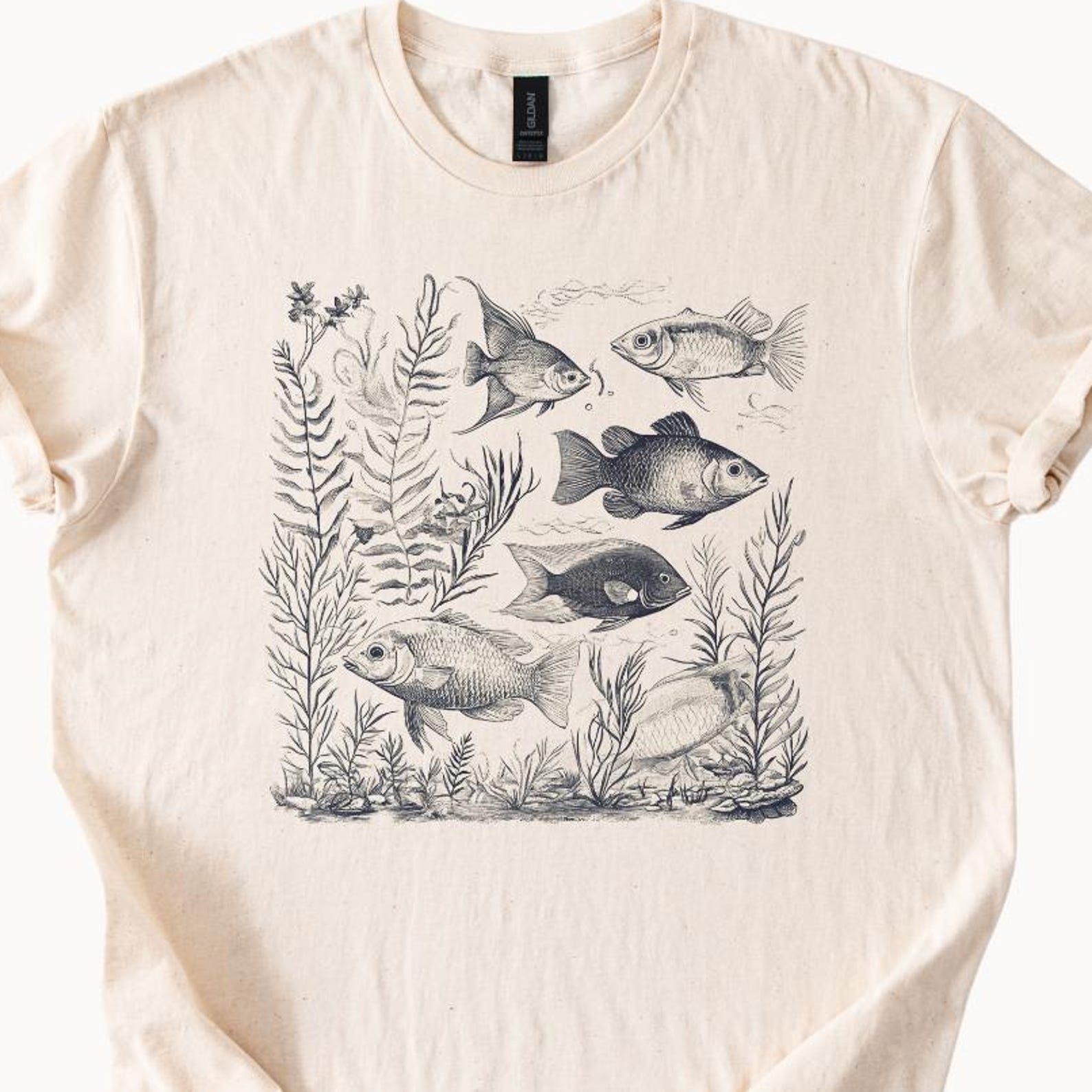 Fish Illustration T-Shirt, Ocean Life Graphic Tee, Marine Animals Shirt, Gift for Wildlife Lovers, Underwater Scene T-Shirt Natural Ivory 140