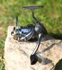 Compact Golf Spinning Reel with Metal Line Cup - Long Cast Genuine Micro Lure Fishing Reel for Casting and Rock Fishing Rods.