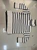 2023 Women's Striped High Neck Loose Knit Sweater with Side Slits