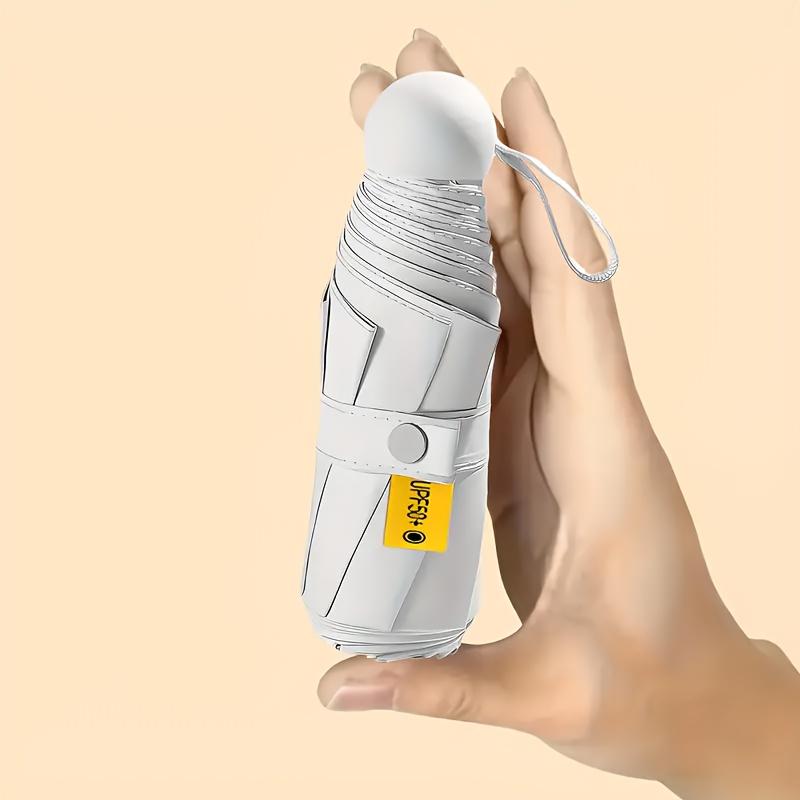 

Зонт складной для взрослых, простой стиль, 6 скелетов, компактный карманный размер, с пластиковой ручкой, подходит для кошелька, легкий, с защитой от ультрафиолета бежевый