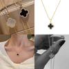 Fashionable Four-leaf Clover Sweater Chain For Women Alloy Material Geometric Design