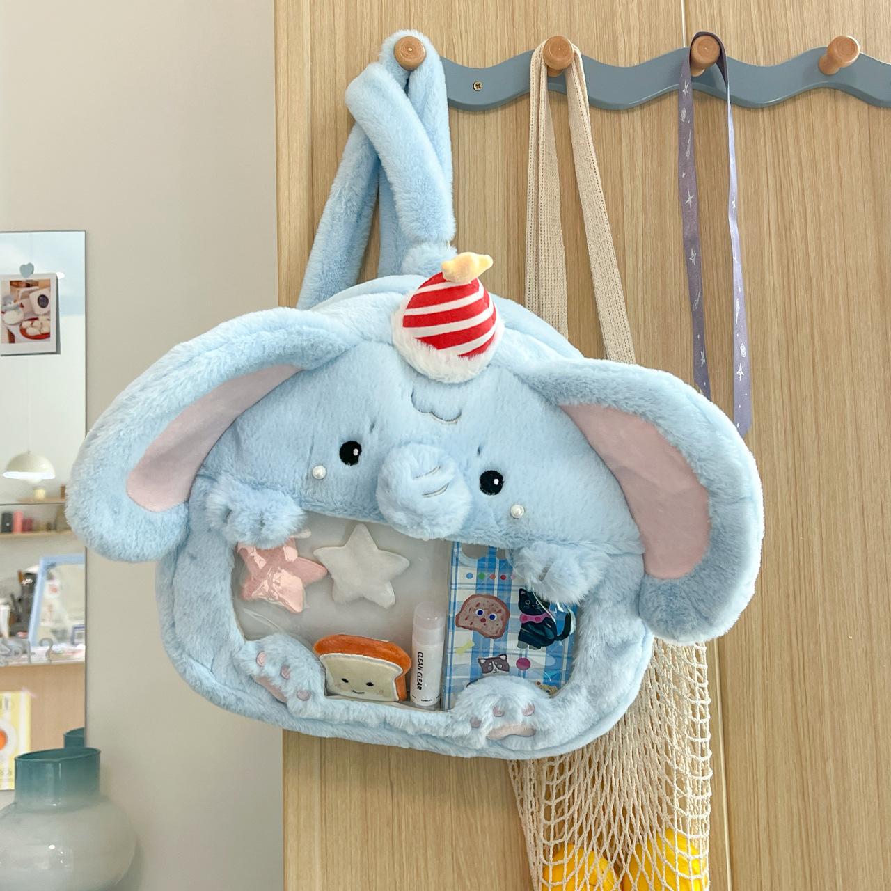 

New large-capacity baby elephant plush perspective backpack fashionable pain bag two-dimensional bar bag 33*41 синий