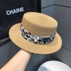 Straw hat women's summer beach seaside vacation sunshade sunscreen hat straw temperament flat top top hat new sun hat