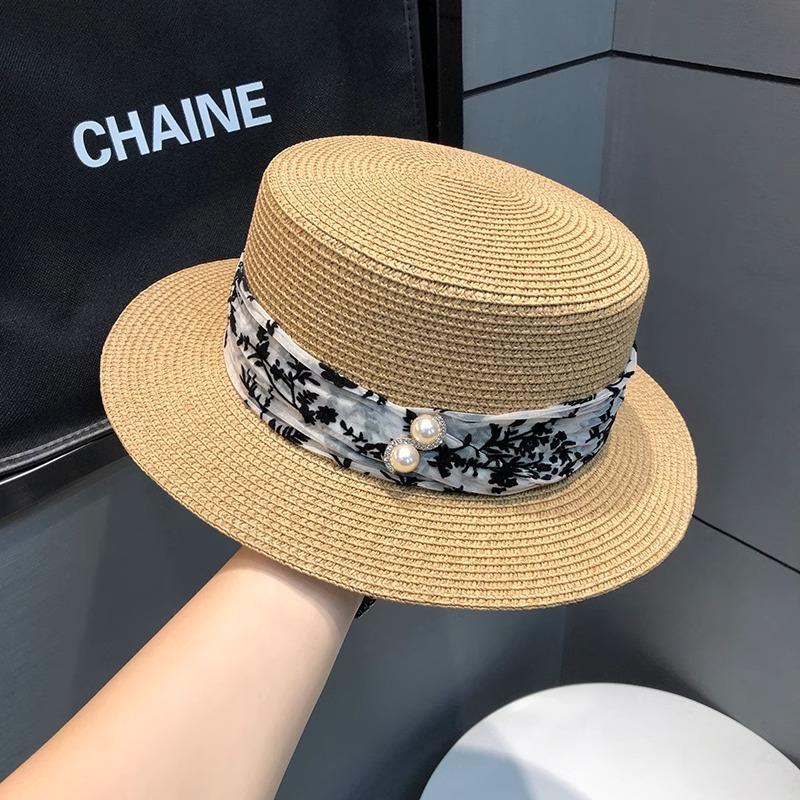 Straw hat women's summer beach seaside vacation sunshade sunscreen hat straw temperament flat top top hat new sun hat