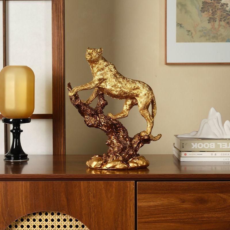 The bookcase with a golden leopard desktop is a high-end, elegant, and modern leopard-shaped decoration for the bedroom