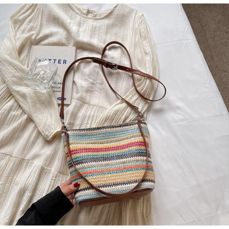 

Summer summer seaside vacation wind woven straw bag women s 2025 new large-capacity commuter shoulder messenger bag 24*11*20 разноцветный