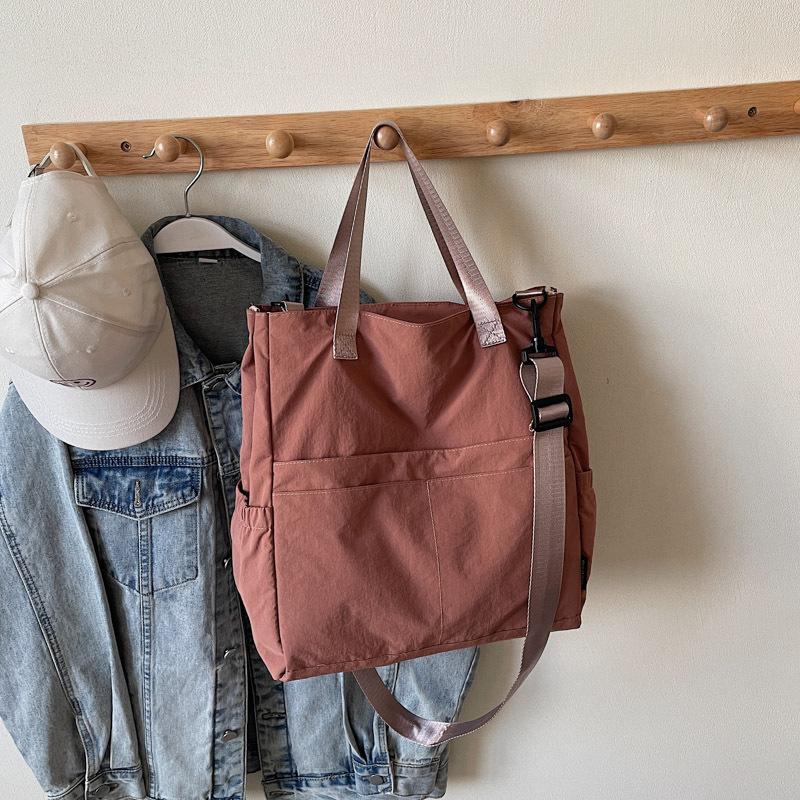 

Simple backpack new large capacity junior high school high school student schoolbag portable shoulder crossbody