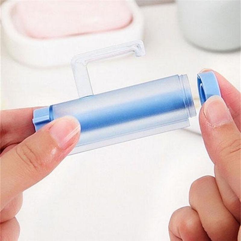 Plastic Device - A Suction Cup Press for Convenient Storage and Uniform Squeezing of Toothpaste Tubes