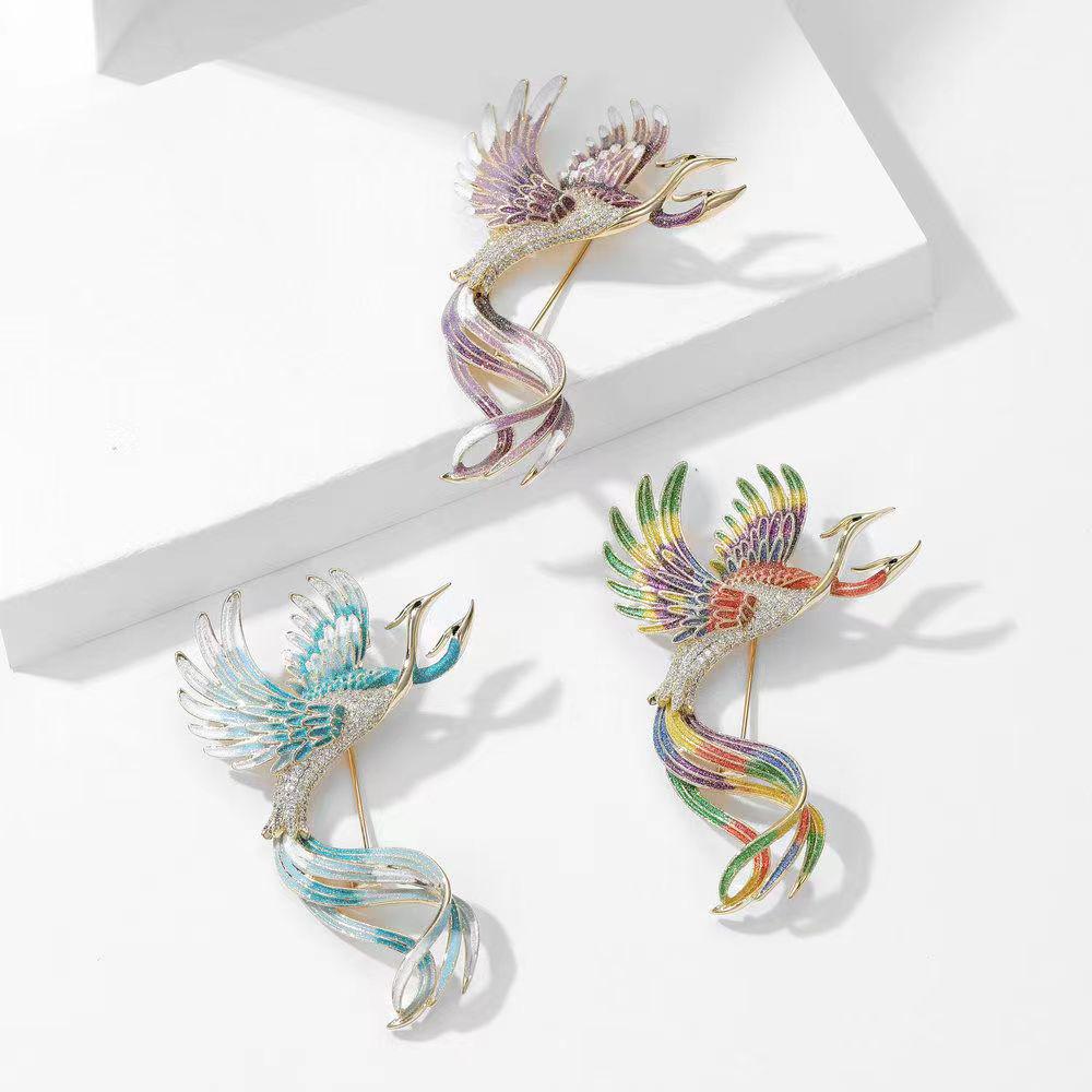 High-End Enamel Brooch: Retro Phoenix Perching on Wutong Tree, Perfect for Women's Cheongsam and Suit Accessories in Ancient Style.