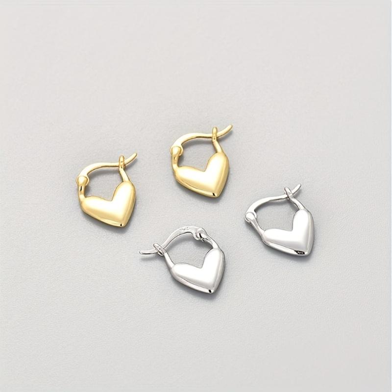 A Pair of Silver Heart-shaped Earrings, Unisex Bohemian Retro Style, Love Themed Jewelry, A Perfect Gift Accessory for Versatile Temperament.
