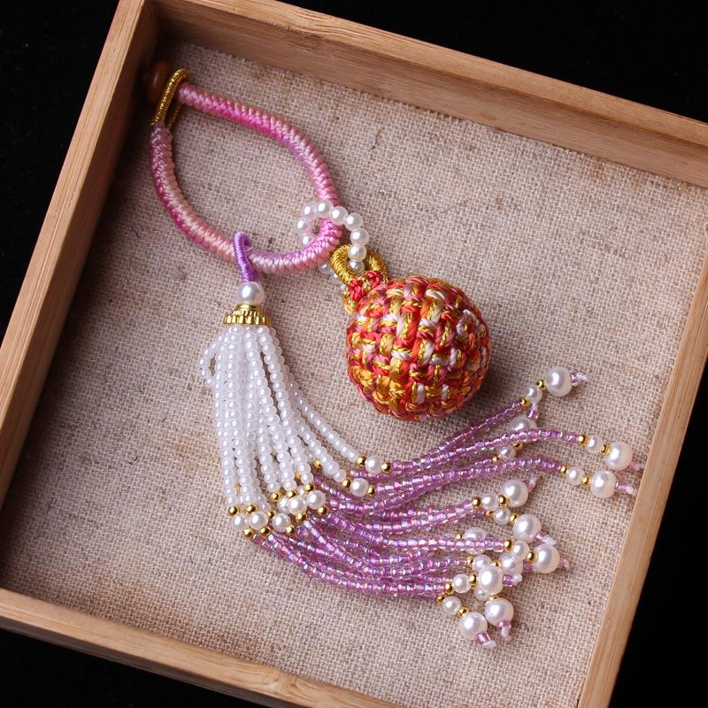 Number 16 Handmade Tassel Accessory with Ball Charm, Pearl, and Spinel Details.