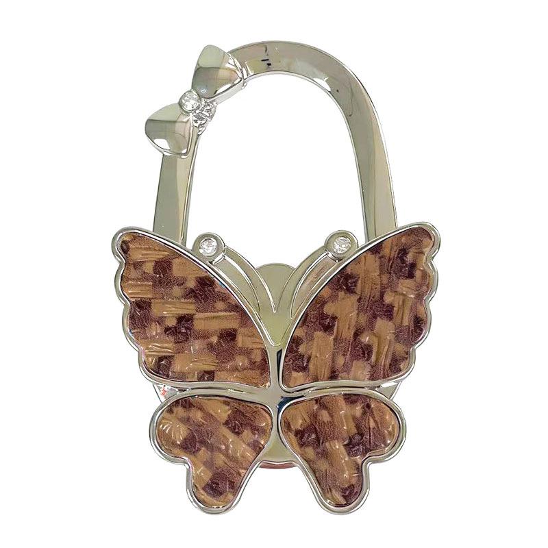 Large Matte Butterfly Hanging Bag Hook - Foldable Women's Bag Buckle & Portable Table Edge Hook for Luggage Accessories.