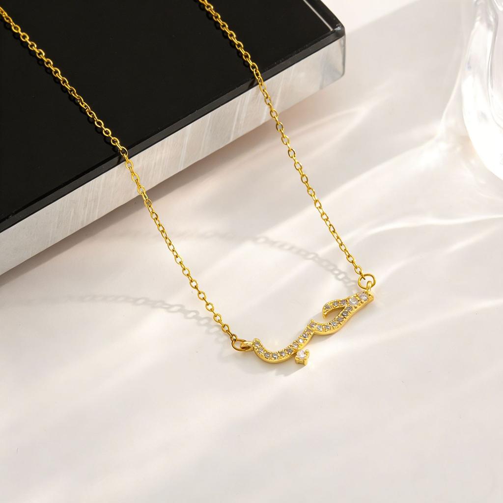 Delicate Chain Necklace with Arabic Script Pendant Featuring Small Embedded Crystals Elegant Minimalist Design for Everyday Wear