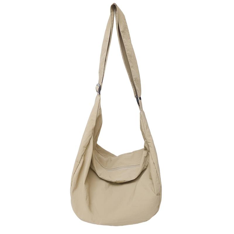 Lazy wind canvas bag new simple dumpling bag versatile women's shoulder bag large capacity commuter messenger bag